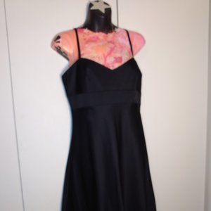Ladies size 6, Black formal.  Strappy nice, above the knee length.